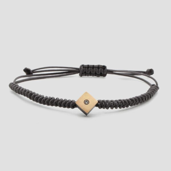 Pulsera de macramé, oro amarillo y plata. Joya creada y hecha a mano por Comin Joieria Creativa